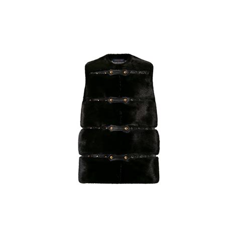 Sleeveless Leather Strip Mink Coat .